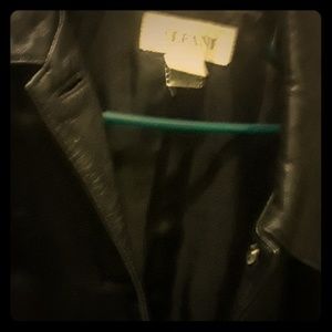 Womens black Leather button closure, waist long.